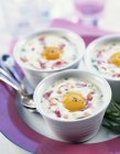Coddled eggs in pots — Stock Photo