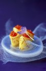 Small ratte patatoes filled with trout roe and saffron — Stock Photo