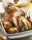 Roast capon with apples — Stock Photo