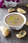 Cream of mushroom soup with truffle oil — Stock Photo