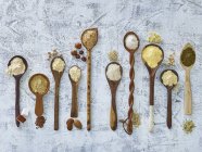 Flour on wooden spoons — Stock Photo