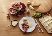 Raclette on white plate — Stock Photo