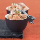 Marinated salmon in bowls — Stock Photo