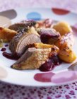 Roasted duckling with cranberry sauce — Stock Photo