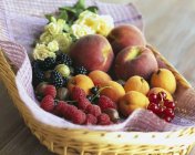 Mixed summer fruits and berries — Stock Photo