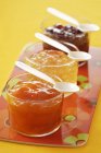 Jars of fruit jams — Stock Photo