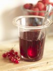 Redcurrant jelly in glass — Stock Photo