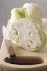 Fresh cauliflower on cutting board — Stock Photo