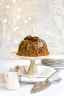 Steamed ginger and date pudding drizzled — Stock Photo