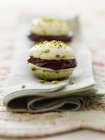 Pistachio macaroons with chocolate — Stock Photo