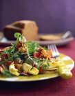 Mesclun salad on plate — Stock Photo