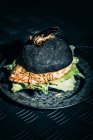 Halloween chicken burger with mealworms — Stock Photo