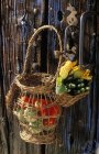 Wicker basket with vegetables — Stock Photo