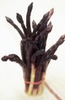 Bunch of Black asparagus — Stock Photo
