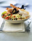 Seafood couscous with vegetables — Stock Photo