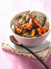 Spicy broth with mussels — Stock Photo