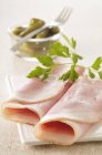 Slices of boiled ham — Stock Photo