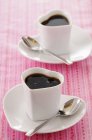 Heart-shaped coffee cups — Stock Photo
