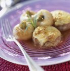 Closeup view of grilled pork with turnips and rosemary — Stock Photo