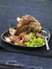 Leg of lamb with beans — Stock Photo