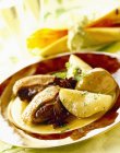 Goose with apples on plate — Stock Photo