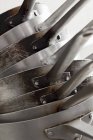 Closeup view of stacked metal saucepans — Stock Photo