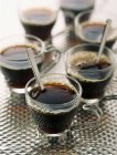Glass cups of black coffee — Stock Photo