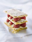 Closeup view of raspberry Mille-feuille with icing — Stock Photo