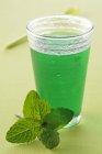Glass of mint cordial — Stock Photo