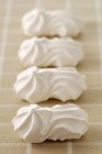 Meringues assorted on table — Stock Photo