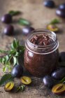 Jar of homemade plum jam — Stock Photo