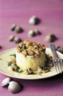 Closeup view of potato Timbale with cockles — Stock Photo