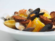Seafood stew with sausage, potatoes and corn — Stock Photo
