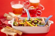 Colourful sausage salad with peppers, cucumber and beans — Stock Photo