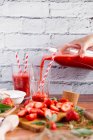 Strawberry smoothies in glasses — Stock Photo