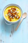 Homemade banana porridge with nuts and honey — Stock Photo