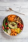 Buddha bowl with vegetables and bulgur, top view — Stock Photo