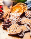 Christmas homemade gingerbread cookies with various decorations — Stock Photo