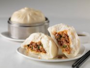 Chinese and pork bao buns with herbs — Stock Photo