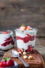 Greek yoghurt with strawberry and chia seed jam and hazelnuts — Stock Photo