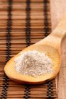 Tsampa flour on a wooden spoon (Tibet) — Stock Photo