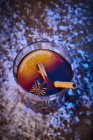 Mulled wine with orange and spices — Stock Photo