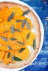 Vegetarian pizza with butternut squash slices, ricotta cheese and sage leaves — Stock Photo