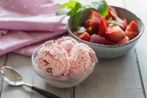 Strawberry ice cream in a glass bowl — Stock Photo