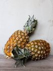 Fresh pineapple on wooden background — Stock Photo