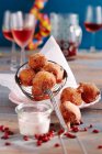 Sweet, deep-fried quark balls with lingonberry yoghurt dip — Stock Photo