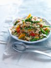 Wild rice salad with chicken and summer vegetables — Stock Photo
