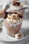 Chocolate ice cream with cream and nuts — Stock Photo