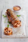 Roast salmon roll with cocktail sauce — Stock Photo