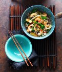 Noodle soup with oysters, ginger, spring onions, broccoli, baby corn and chili — Stock Photo
